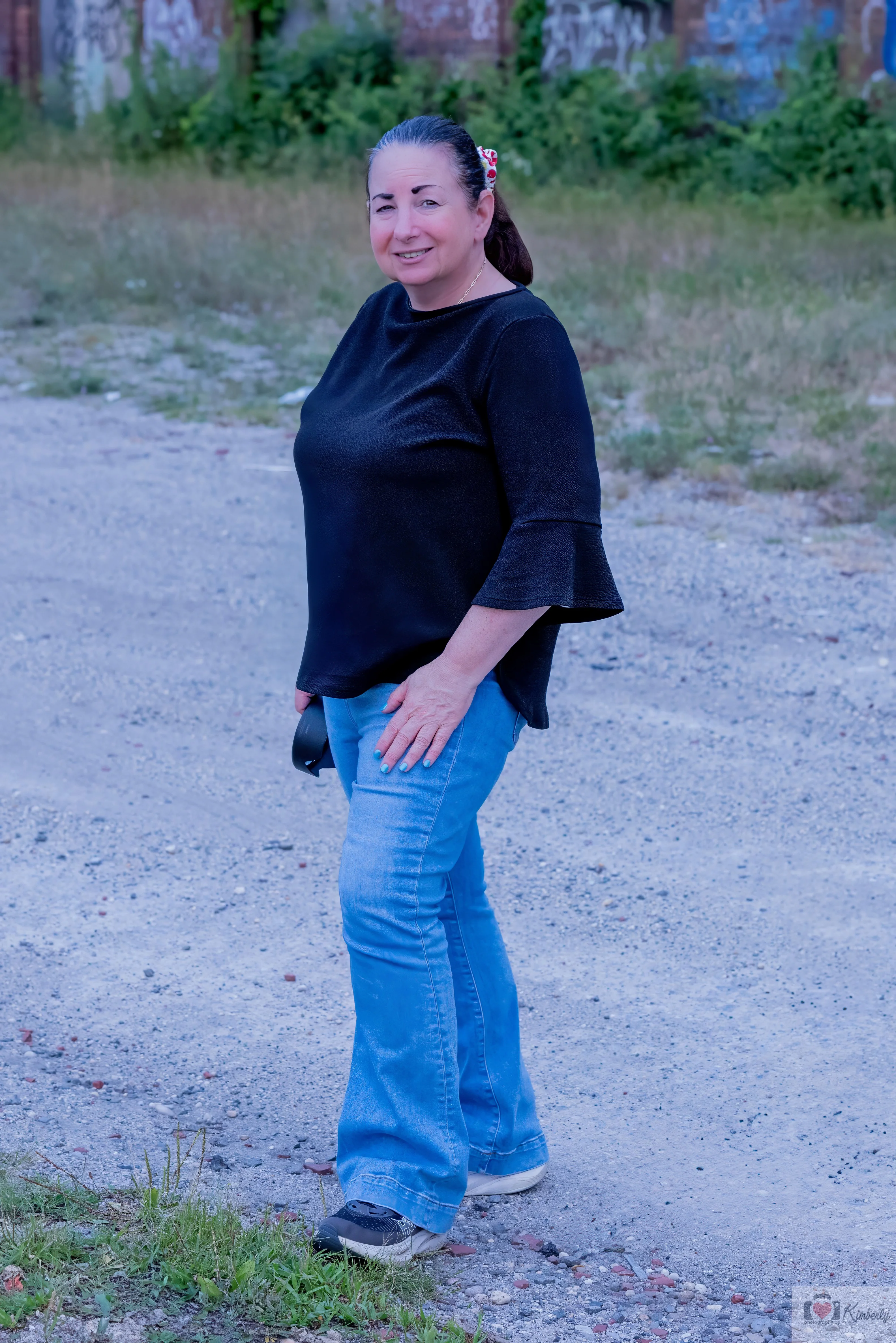 Kimberly - Professional photographer with warm smile
